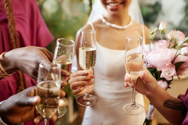 people-celebrating-and-toasting-with-champagne-glasses-during-wedding.jpg